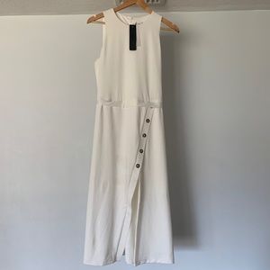 Black halo sleeveless cream dress by Laurel Berman Campbell